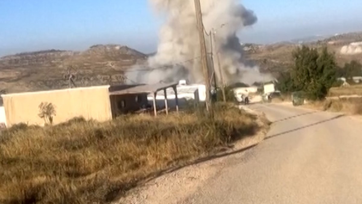 Smoke rises in illegal Israeli settlement after Iranian missile attack