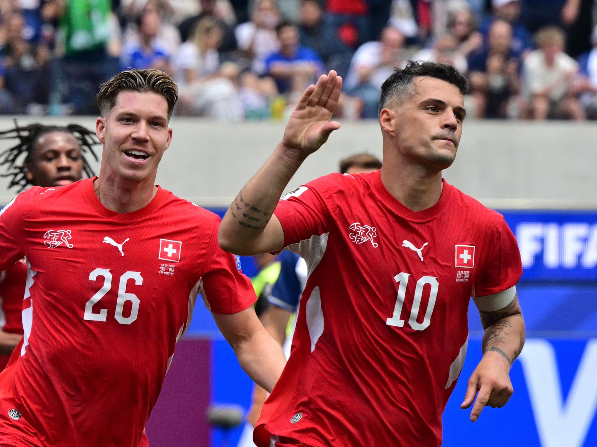 Switzerland tops Group B with 4-1 win over Bosnia and Herzegovina